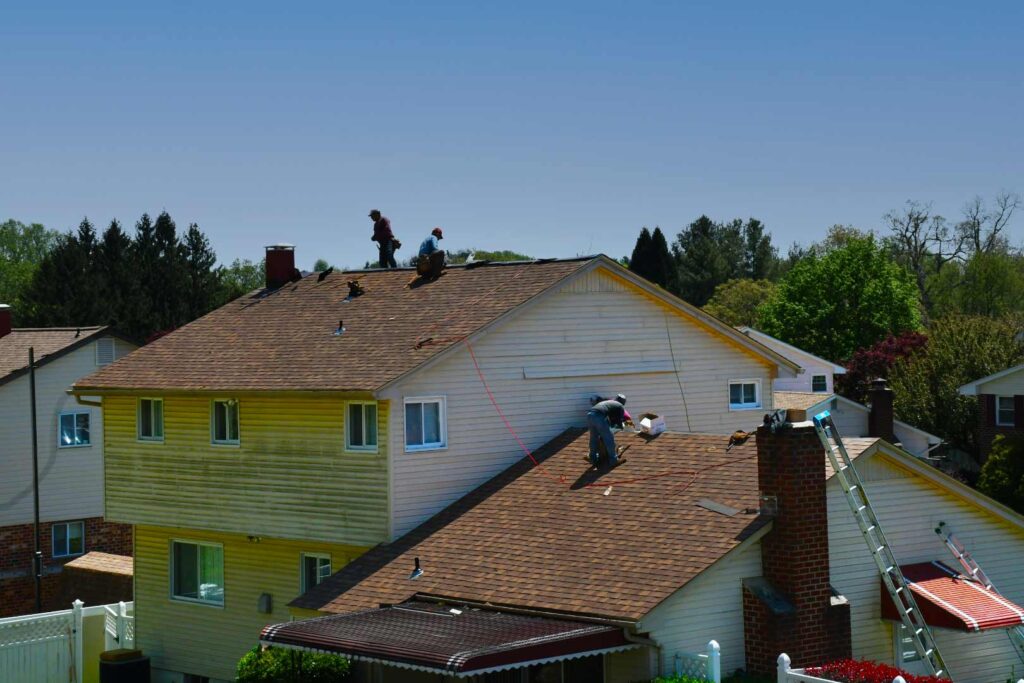 workers on roof , house construction